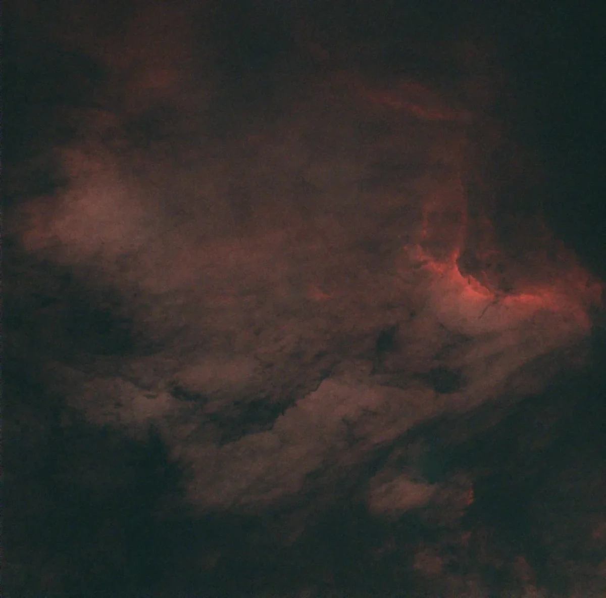 The North America Nebula (NGC 7000) with the stars and in its "starless" version