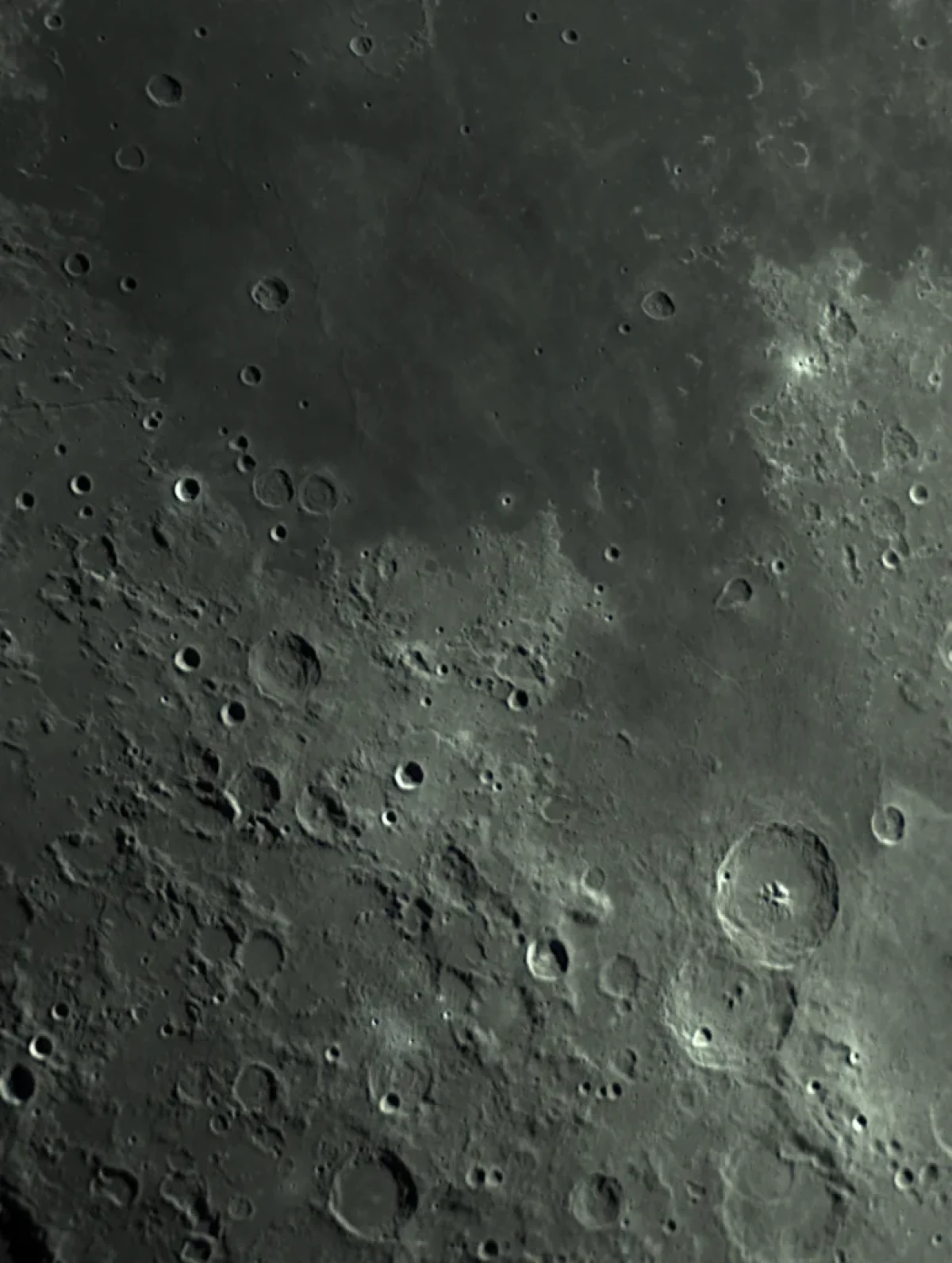 Scroll the slider to switch between the images of the Moon and its annotated image