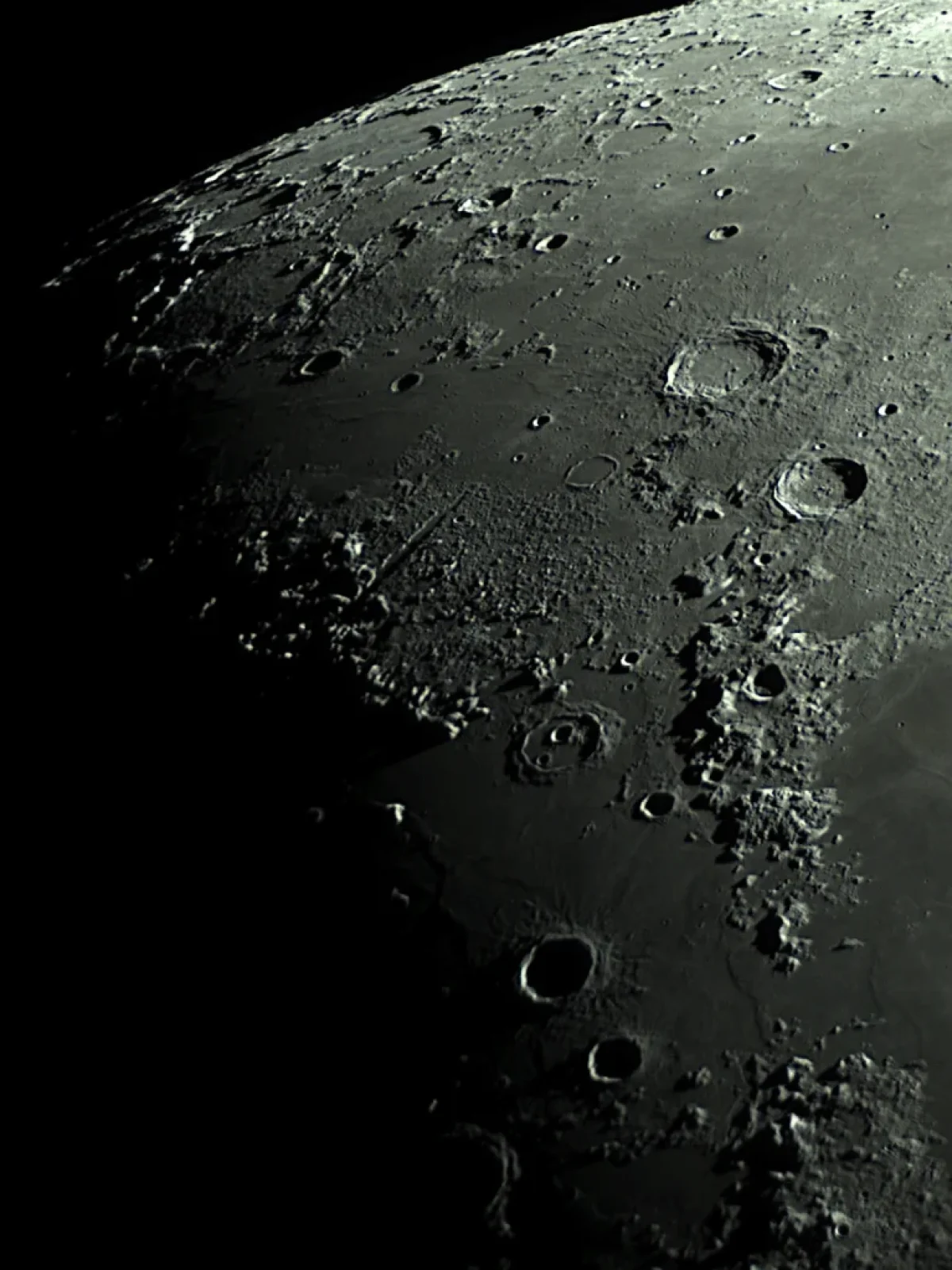 Scroll the slider to switch between the images of the Moon and its annotated image